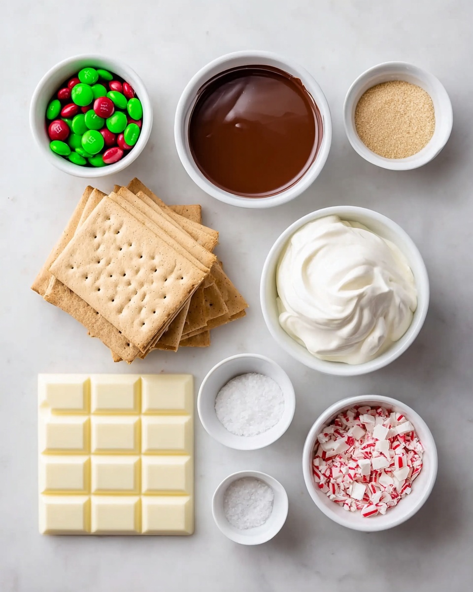 The image shows seven white bowls and plates arranged on a white marbled surface, each containing different ingredients. Starting from the top left, there is a small white bowl filled with green and red candy-coated chocolates. Next to it is a white bowl with smooth, shiny dark brown melted chocolate. To the right is a white bowl with light brown granulated sugar. Below the candy chocolates, five square beige graham crackers are layered and slightly overlapping each other. In the center right is a white bowl filled with thick white cream, swirled on top. Below the cream is a small white bowl with crushed red and white peppermint candy pieces. On the bottom left corner is a bar of white chocolate with rectangular sections. In the middle, there is also a tiny white bowl with a small amount of salt or powdery white substance. photo taken with an iphone --ar 4:5 --v 7
