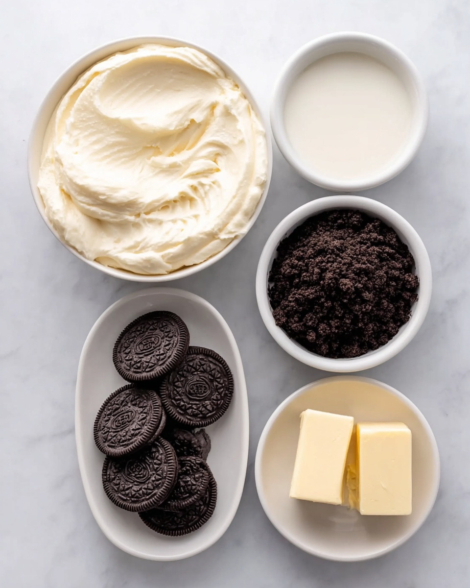 The image shows five white bowls and plates with ingredients on a white marbled surface. The largest bowl is filled with thick, creamy white filling with a smooth texture on top. Next to it, a smaller bowl holds white liquid, smooth like milk. Another white bowl contains dark brown, finely crushed cookie crumbs with a crumbly texture. A white oval plate displays whole dark chocolate cookies with a detailed pattern on top. The last small white bowl has two thick, pale yellow butter blocks with a soft, smooth texture. The arrangement is neat and clean, showing all ingredients clearly. photo taken with an iphone --ar 4:5 --v 7