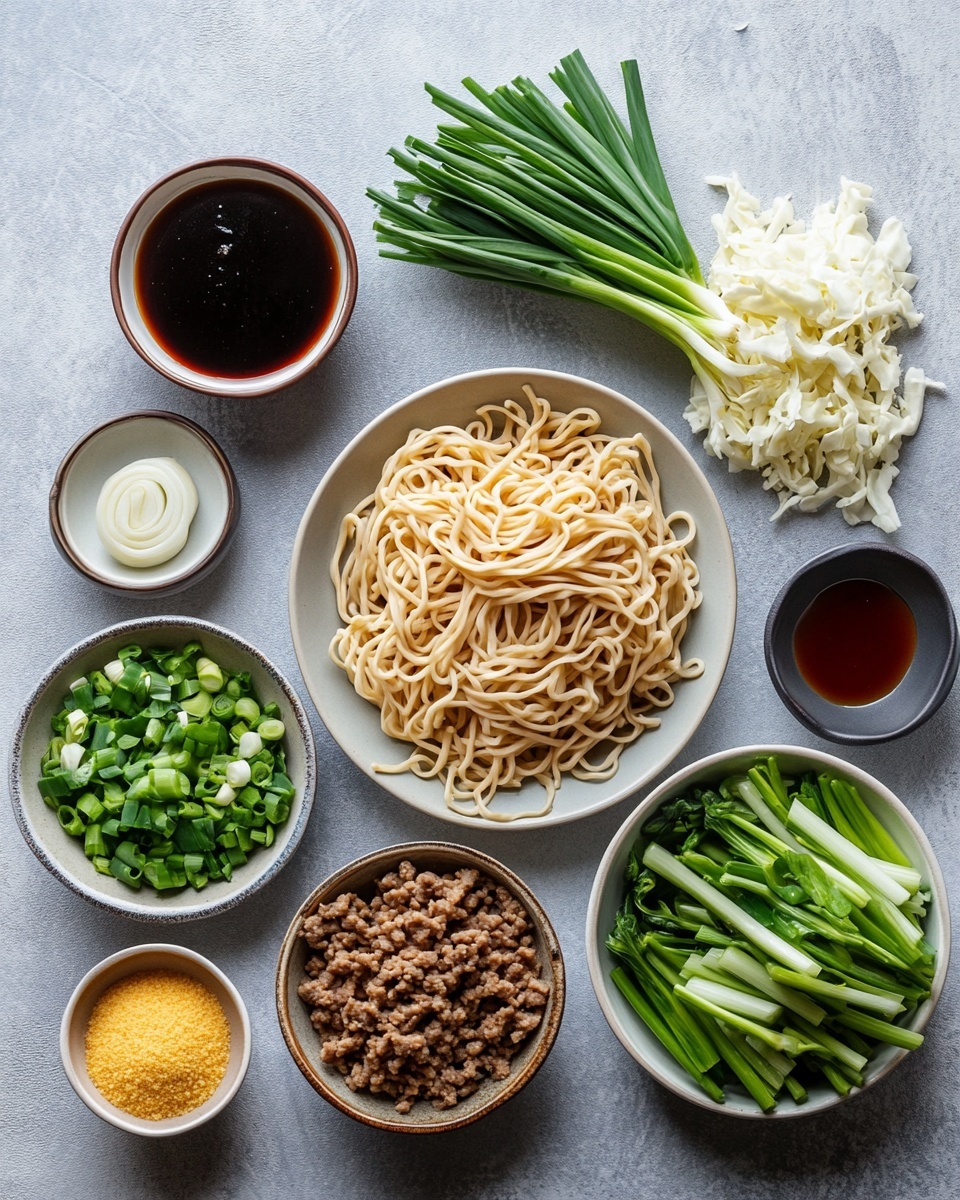 A black bowl filled with wavy yellowish noodles mixed with small chunks of cooked brown meat, topped with chopped green onions. A pair of brown wooden chopsticks lifts a portion of noodles and meat out of the bowl, showing the shiny sauce coating them. The bowl sits on a wooden surface with scattered green onion pieces, and the background is blurred with green plants and another similar bowl. photo taken with an iphone --ar 4:5 --v 7