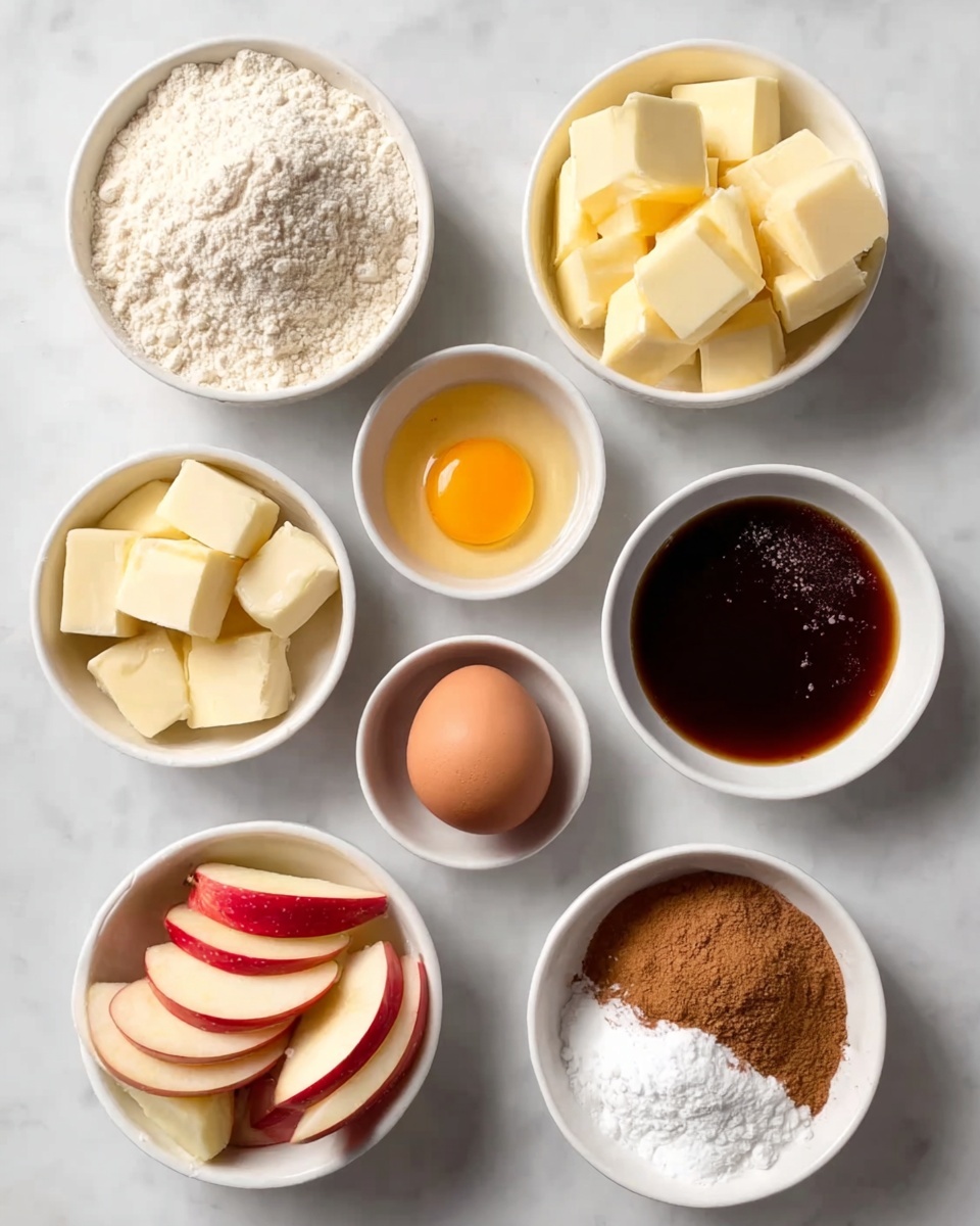 The image shows eight small white bowls arranged on a white marbled surface, each holding a different baking ingredient. In the top row are two bowls containing off-white flour and yellow butter cubes with smooth texture. Below, a white bowl holds a raw egg with bright yellow yolk surrounded by clear egg white. Next to it is a small bowl of light brown sugar and one with dark brown vanilla extract, shiny and thick. In the middle row, there is a bowl with a whole brown egg, smooth and oval. At the bottom left, a bowl is filled with red apple slices showing white inner flesh and smooth skin. The last two bowls hold light brown cinnamon powder and white powdered sugar, both fine and loose in texture. The overall scene is neat and clean with soft natural light illuminating the ingredients photo taken with an iphone --ar 4:5 --v 7
