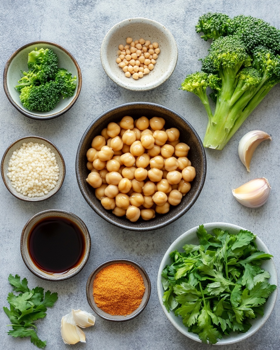 The image shows a white bowl filled with three main layers. The bottom layer is white rice, partially visible at the sides. On the left, bright green broccoli florets are placed, showing a rich texture and small red flakes on top. The right side is filled with glossy, brown chickpeas coated in a sauce, sprinkled with white sesame seeds and small red pepper flakes. Thinly sliced green onions are scattered over the chickpeas, adding more green color. A silver spoon rests inside the bowl. The bowl sits on a white marbled surface with some scattered red flakes around it. Photo taken with an iphone --ar 4:5 --v 7