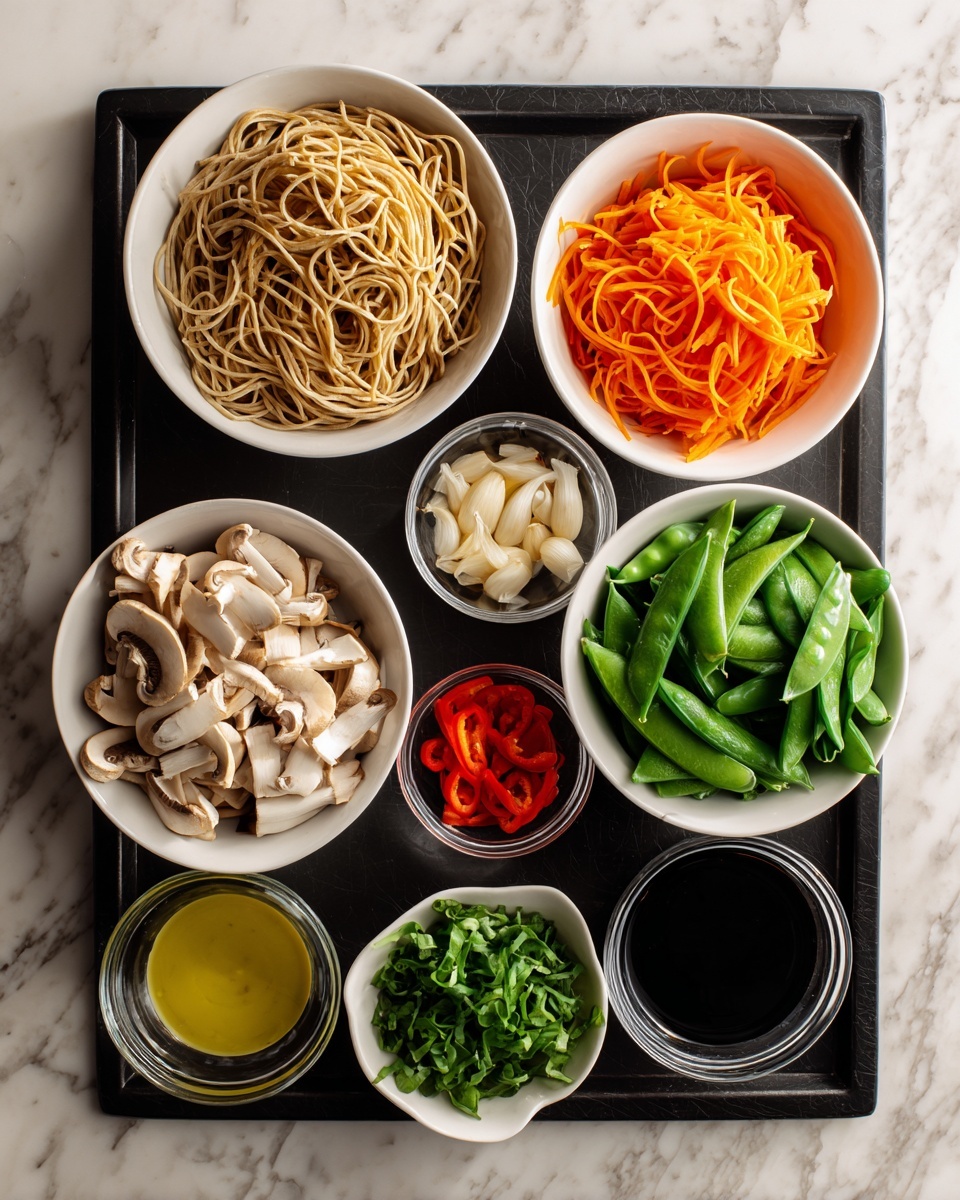 The image shows a black tray on a white marbled surface holding several white bowls and glass cups with different ingredients for cooking. Starting from the top left, there is a bowl filled with plain light brown noodles. To the right, a white bowl contains bright orange shredded carrots. Below the noodles, a white bowl holds pale beige sliced mushrooms. Next to the carrots, a glass cup is filled with fresh green snow peas. Below the mushrooms, a white bowl is full of fresh dark green spinach leaves. Near the center bottom, a small white bowl holds chopped green vegetables, then next to it a small white bowl with a yellow liquid sauce or oil. Another small cup contains minced garlic, and beside that is a clear container with thin red bell pepper strips. A small glass jar contains dark soy sauce. All the items are cleanly arranged, showing various fresh textures and colors on the black tray. Photo taken with an iphone --ar 4:5 --v 7