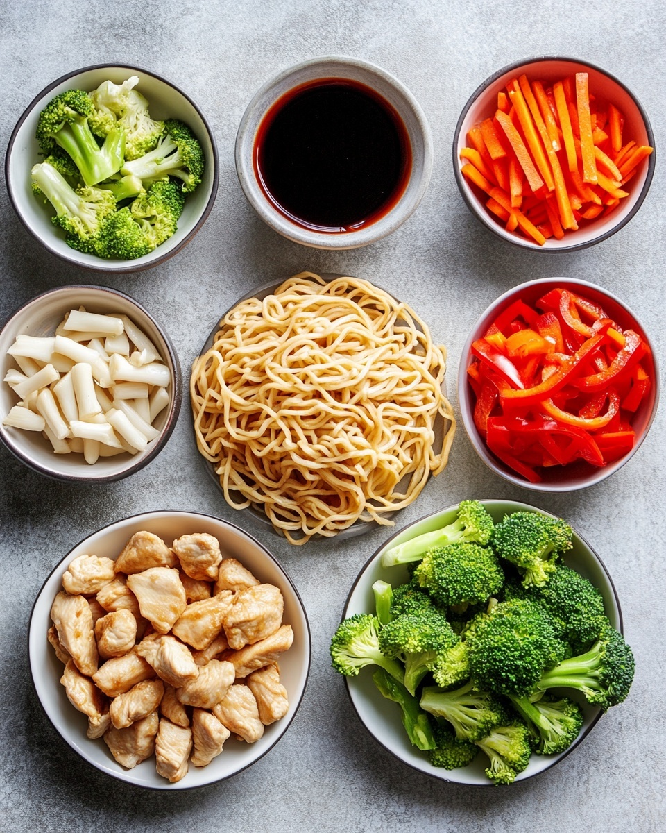 A white speckled bowl holds a colorful stir fry with three main layers: yellow stir fry noodles make up most of the dish, with bright green broccoli florets and sliced green and red bell peppers scattered throughout. There are light brown pieces of cooked chicken mixed in, all topped with small white sesame seeds. The bowl sits on a white marbled surface. photo taken with an iphone --ar 4:5 --v 7
